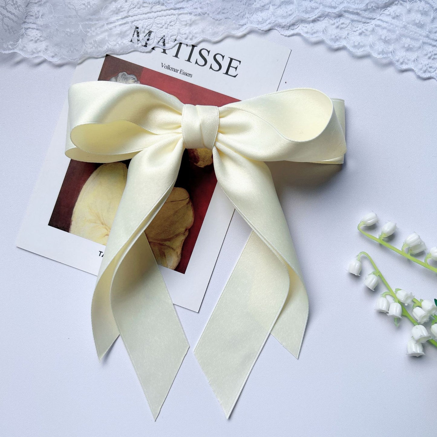 Girl hiding versatile bow ribbon hair clip