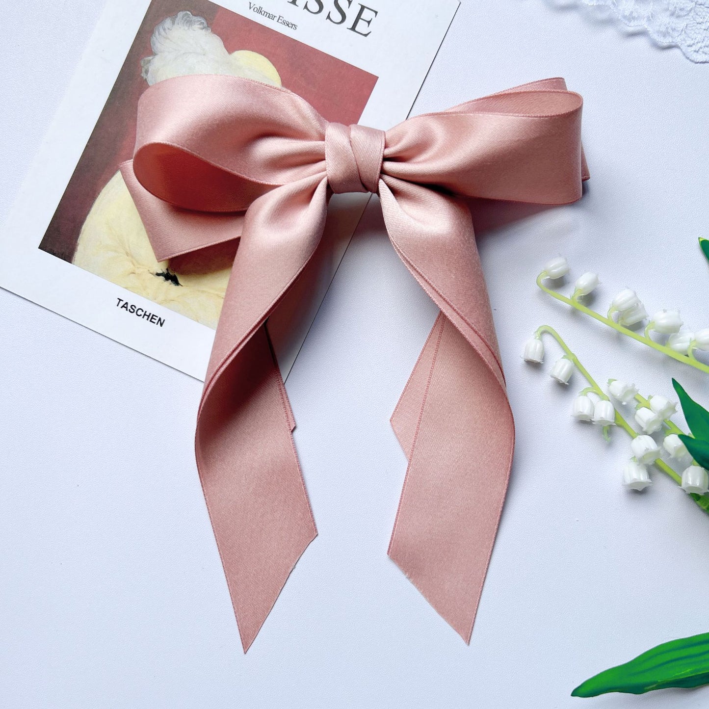 Girl hiding versatile bow ribbon hair clip