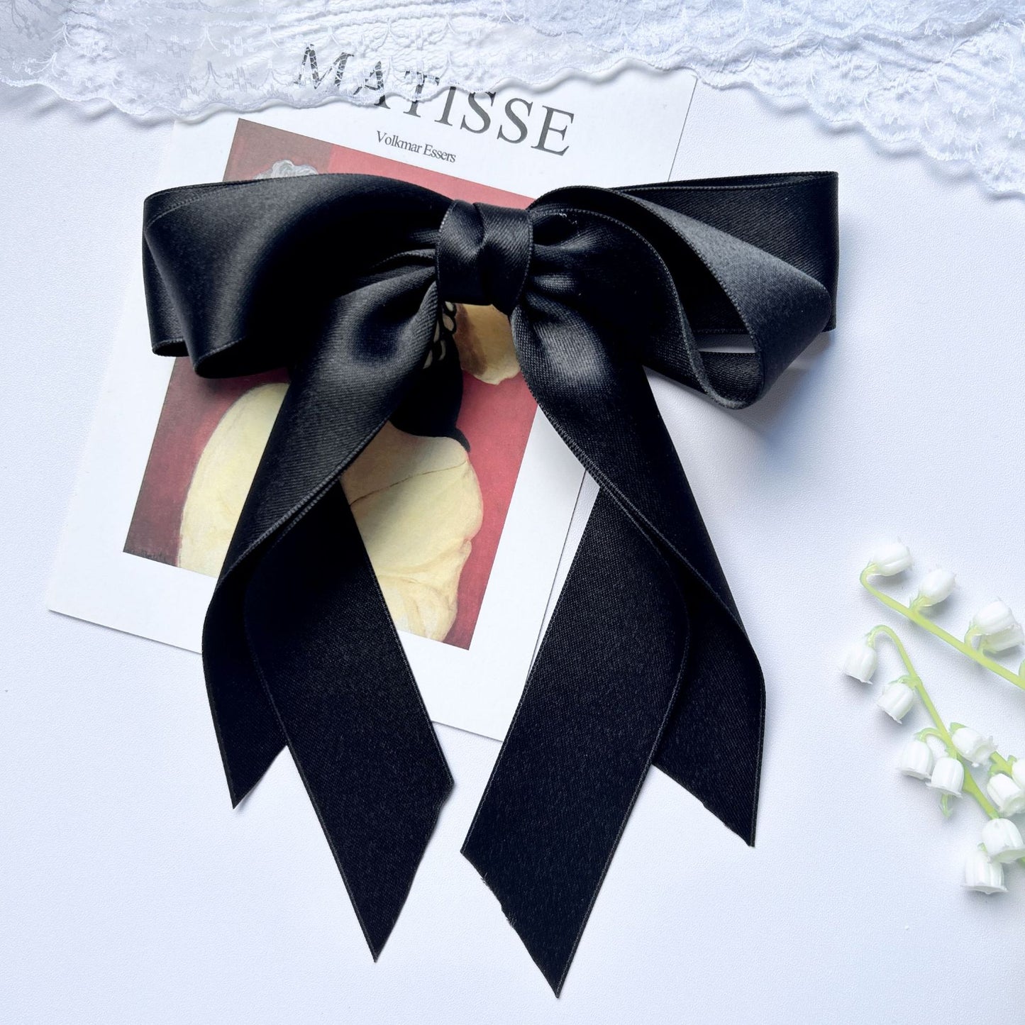 Girl hiding versatile bow ribbon hair clip